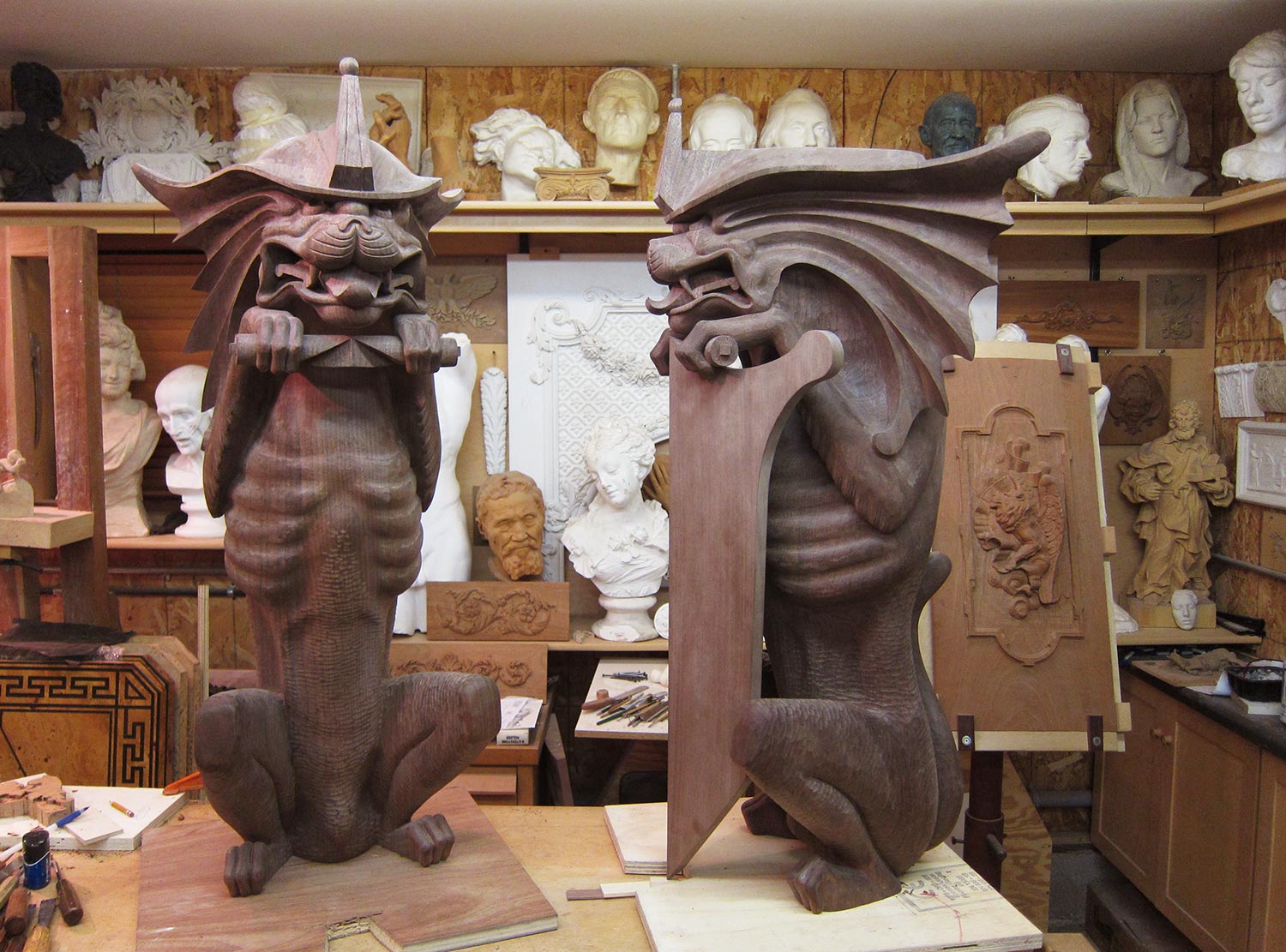 Carved Walnut Griffins with shields